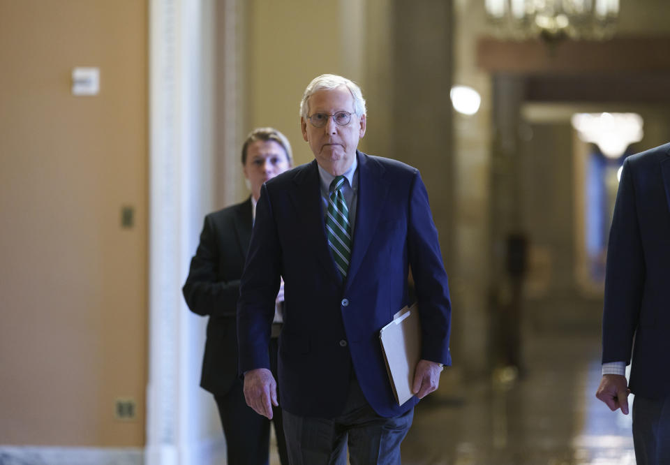 Senate Minority Leader Mitch McConnell, R-Ky., walks to the chamber to begin the work week at the Capitol in Washington, Monday, May 24, 2021. The House has already voted to approve an independent commission to investigate the Jan. 6 U.S. Capitol insurrection but the measure faces an uncertain fate in the evenly divided Senate where Republican leader Mitch McConnell is opposed and former President Donald Trump is demanding the effort be quashed. (AP Photo/J. Scott Applewhite)