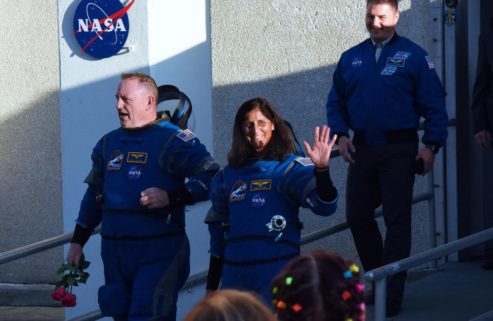 NASA astronauts Butch Wilmore (L) and Suni Williams walk out of the Neil Armstrong Operations and Checkout Building at the Kennedy Space Center on May 6, 2024 in Cape Canaveral, Florida.<span class="copyright">Paul Hennessy—Anadolu/Getty Images</span>