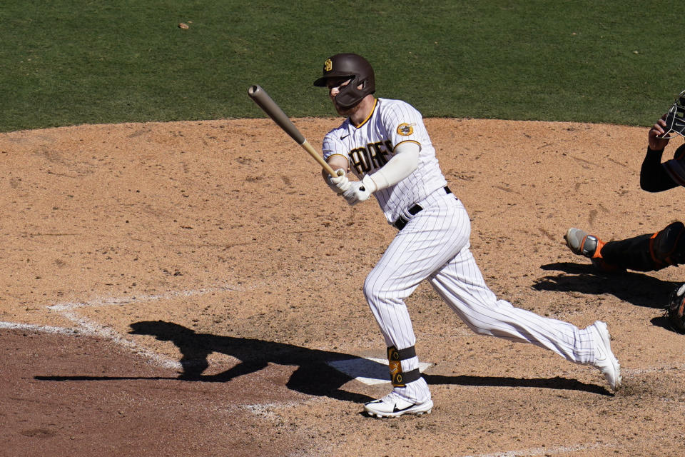 San Diego Padres' Brandon Drury watches his three-run home run hit during the sixth inning of a baseball game against the San Francisco Giants, Wednesday, Aug. 10, 2022, in San Diego. (AP Photo/Gregory Bull)