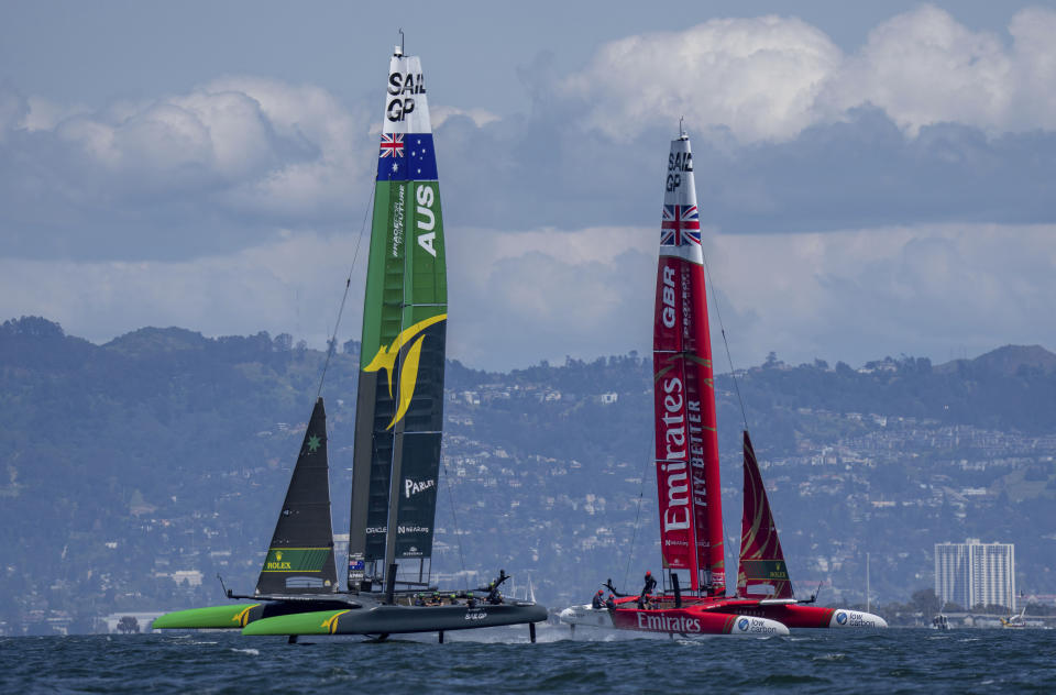 In this photo provided by SailGP, Australia SailGP Team helmed by Tom Slingsby and Emirates Great Britain SailGP Team helmed by Ben Ainslie in action on Race Day 2 of the Mubadala SailGP Season 3 Grand Final in San Francisco, Sunday, May, 7 2023. (Bob Martin/SailGP via AP)