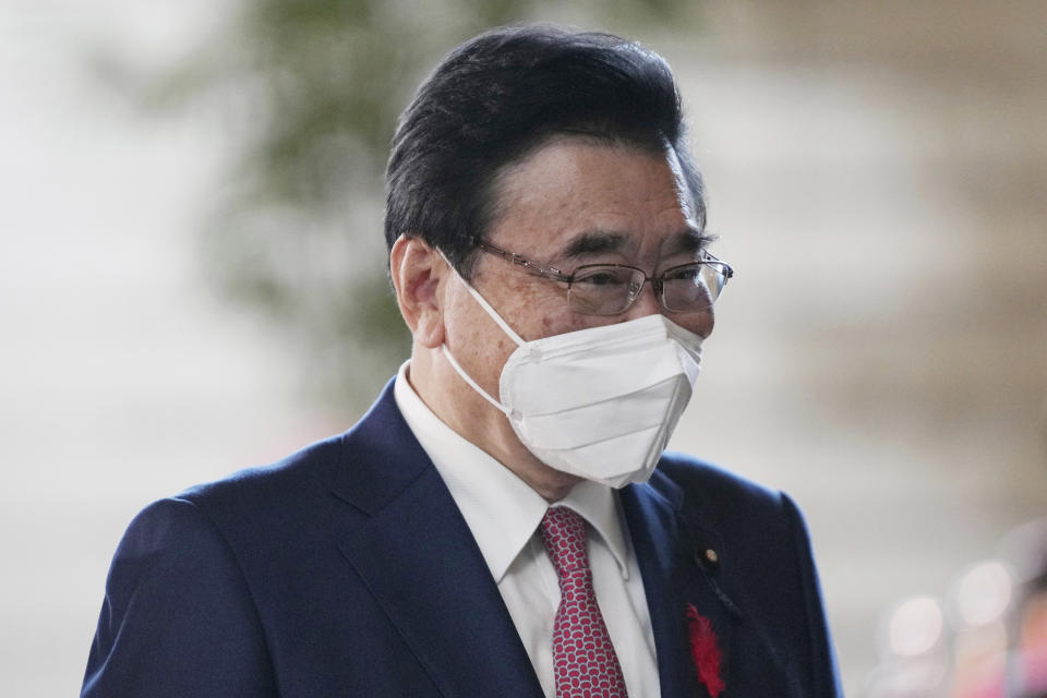 FILE - Shigeyuki Goto, newly appointed minister of Health, Labour and Welfare, arrives at the prime minister's official residence Monday, Oct. 4, 2021, in Tokyo. Japan’s health ministry on Tuesday, April 19, 2022, formally approved Novavax's COVID-19 vaccine, a fourth foreign-developed tool to combat the infections as the country sees signs of a resurgence led by a subvariant of fast-spreading omicron. (AP Photo/Eugene Hoshiko, File)