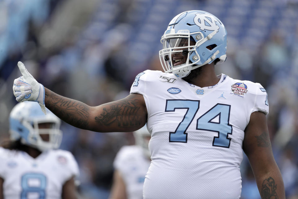 North Carolina offensive lineman Jordan Tucker gestures toward an official during the first half of the Military Bowl NCAA college football game against Temple, Friday, Dec. 27, 2019, in Annapolis, Md. (AP Photo/Julio Cortez)