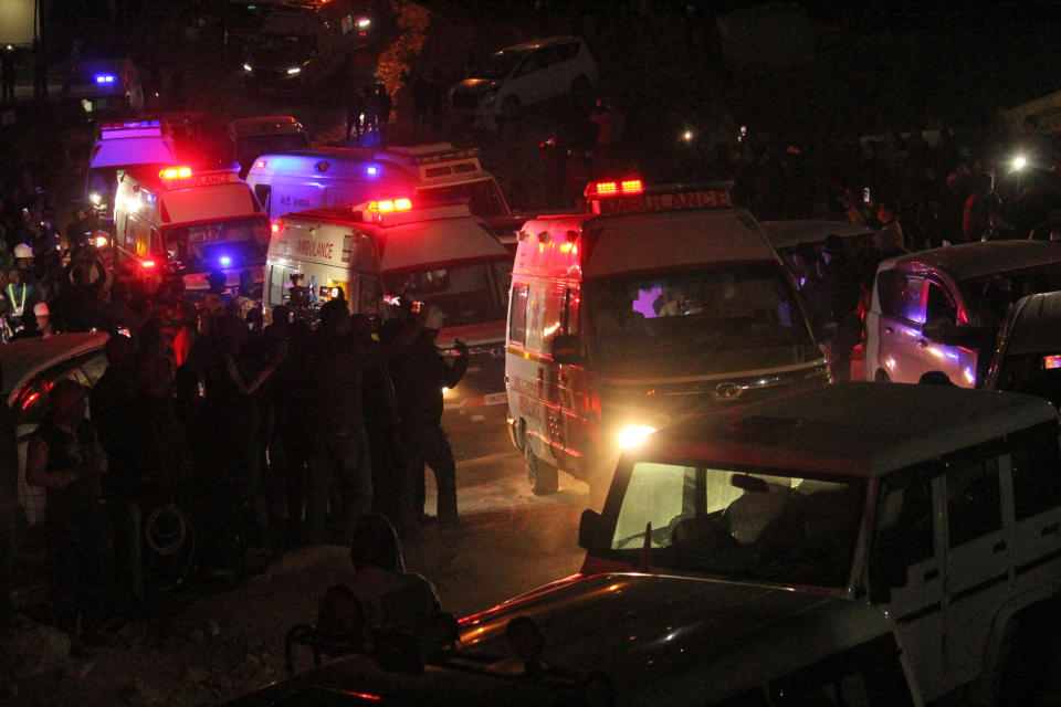 Ambulances drive past carrying workers rescued from the site of an under-construction road tunnel that collapsed in Silkyara in the northern Indian state of Uttarakhand, India, Tuesday, Nov. 28, 2023. India’s transportation minister says all 41 construction workers who were trapped in a collapsed mountain tunnel in the country’s north have been pulled out. (AP Photo)