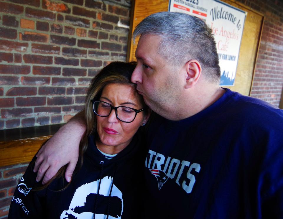 Anastasia Grantsis of Bridgewater is comforted by her brother Nicholas Grantsis of West Bridgewater, as they talkd about their brother Greg Grantsis on Friday, Sept. 22, 2023, at Joe Angelo's in Brockton. Greg Grantsis was shot to death on Nov. 9, 2021 in Brockton.