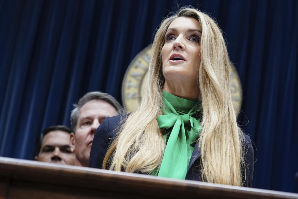 Businesswoman Kelly Loeffler speaks after she was introduced by Georgia Gov. Brian Kemp as his pick to fill Georgia's vacant U.S. Senate seat at the Georgia State Capitol on Wednesday, Dec. 4, 2019, in Atlanta. (AP Photo/Elijah Nouvelage)