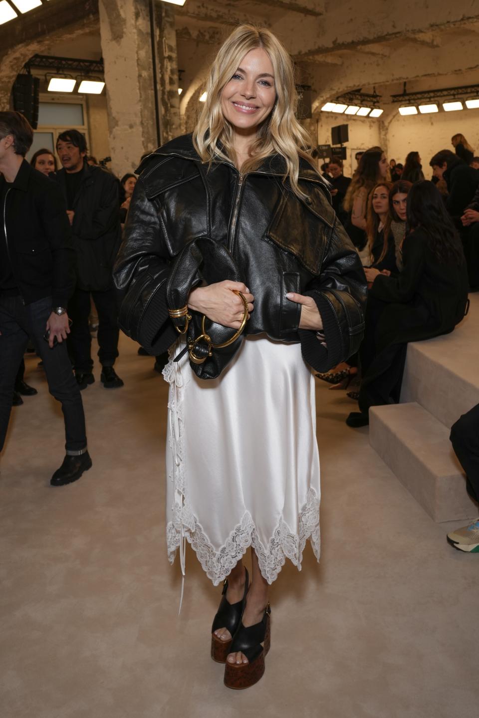 Sienna Miller attends the Chloe Fall/Winter 2024-2025 ready-to-wear collection presented Thursday, Feb. 29, 2024 in Paris. (Photo by Scott A Garfitt/Invision/AP)