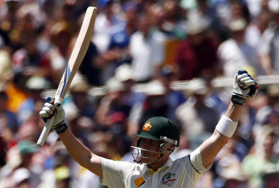 Australia's Brad Haddin celebrates his century during the second day's play in the second Ashes cricket test against England at the Adelaide Oval December 6, 2013.