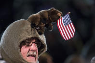 <p>Crowd member wears a Groundhog day themed headwear before ceremonies for Groundhog Day on Feb. 2, 2018 in Punxsutawney, Pa. (Photo: Brett Carlsen/Getty Images) </p>