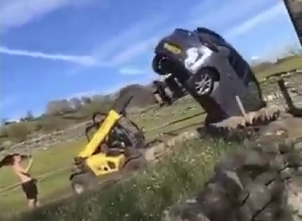 A British farmer took extreme measures to remove a car blocking his driveway. — Screencap via Facebook/Dash Cam Yorkshire UK