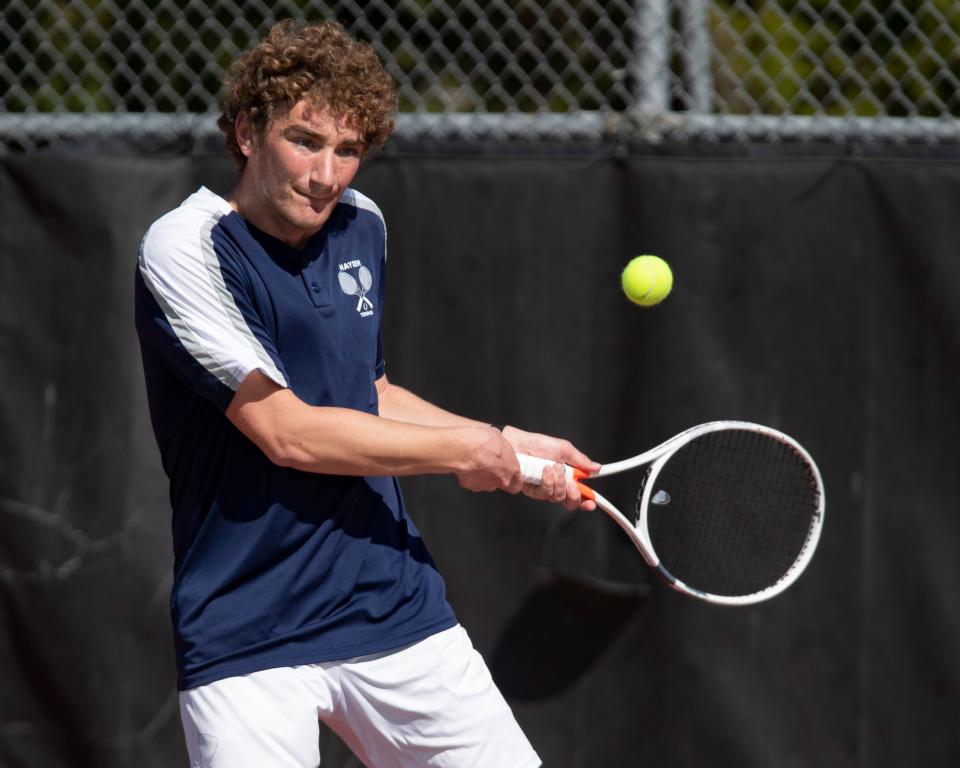 Hayden Michael Sandstrom returns the ball April 2 at Kossover Tennis Court.