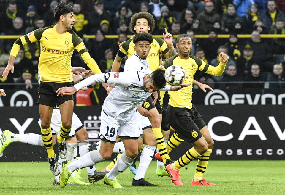 Hoffenheim's Ishak Belfodil heads his side's third goal during the German Bundesliga soccer match between Borussia Dortmund and TSG 1899 Hoffenheim in Dortmund, Germany, Saturday, Feb. 9, 2019. The match ended 3-3. (AP Photo/Martin Meissner)