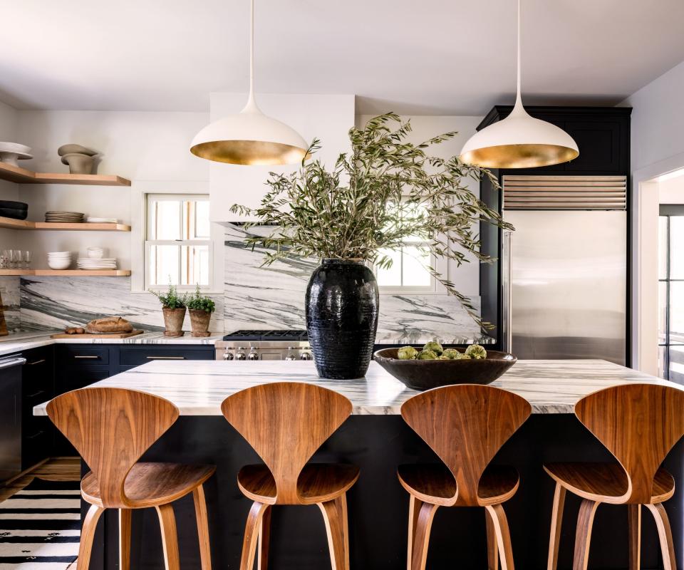 Black and white kitchen, wooden chairs