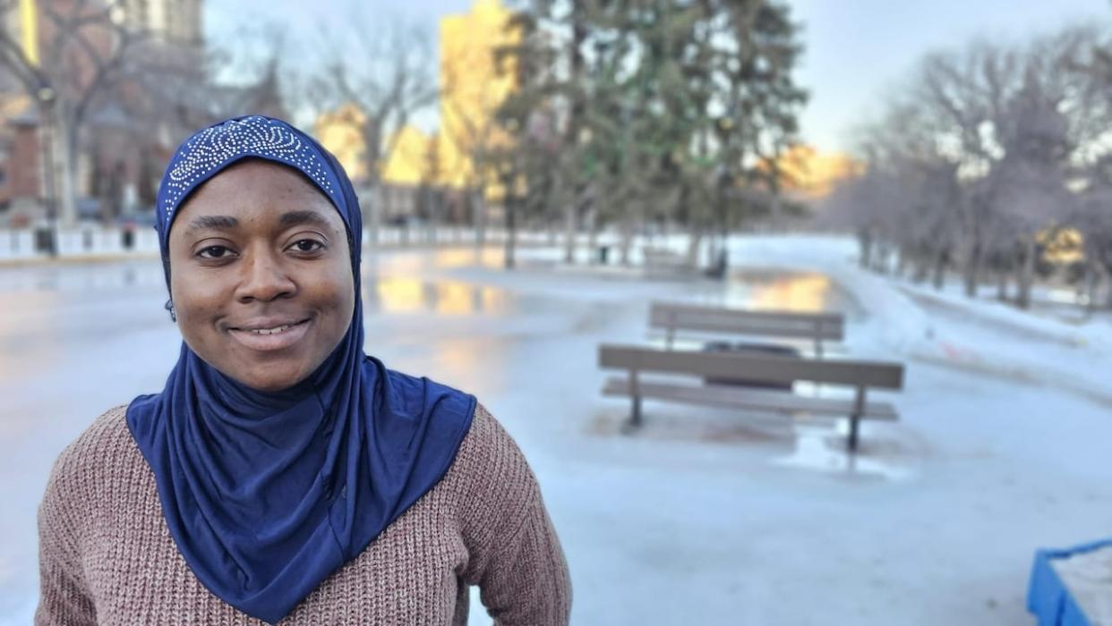 Aisha Adelah had to learn how to dress for Saskathewan winters after taking a job at an outdoor skating rink. She asked Good Question, Saskatchewan for help. (Chanss Lagaden/CBC - image credit)