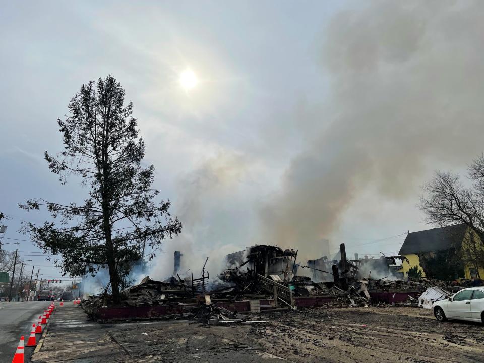 The Rigbie Apartments building, on North Central Avenue in Laurel, was still smoldering Friday afternoon.