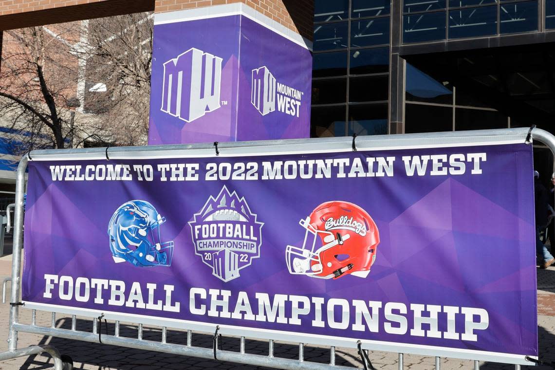 Mountain West Football Championship football banners are displayed outside the stadium before an NCAA college football game for the championship between Fresno State and Boise State, Saturday, Dec. 3, 2022, in Boise, Idaho. (AP Photo/Otto Kitsinger)