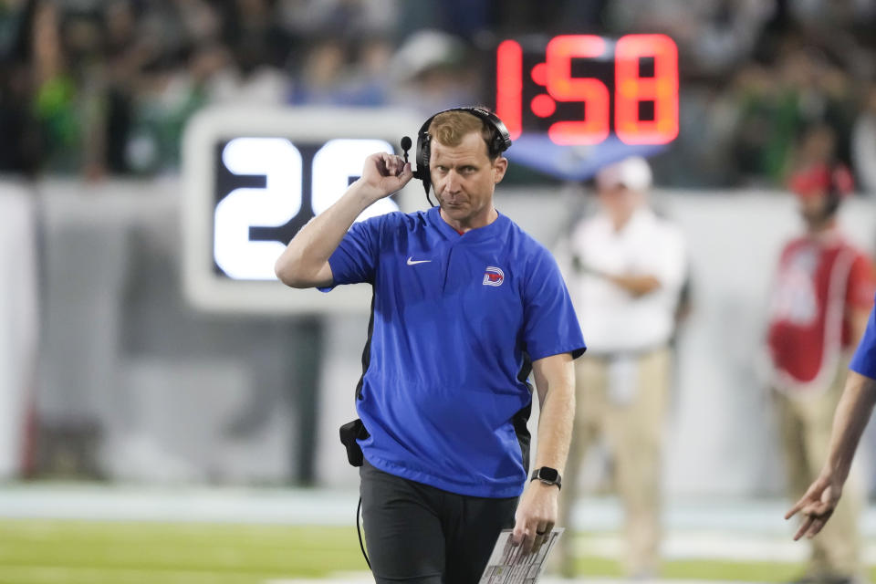 SMU head coach Rhett Lashlee walks on the sideline during a timeout in the second half of the American Athletic Conference championship NCAA college football game, Saturday, Dec. 2, 2023 in New Orleans. SMU won 26-14. (AP Photo/Gerald Herbert)