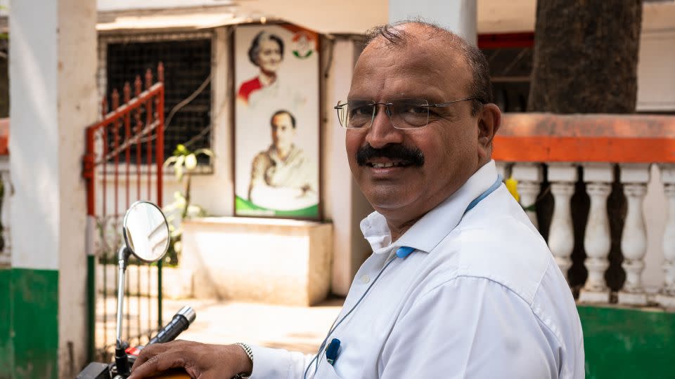 Sanjay Sardesai sits on his motorbike outside of the Indian National Congress headquarters during an interview with CNN in Mumbai, India, on April 16, 2024. - Noemi Cassanelli/CNN