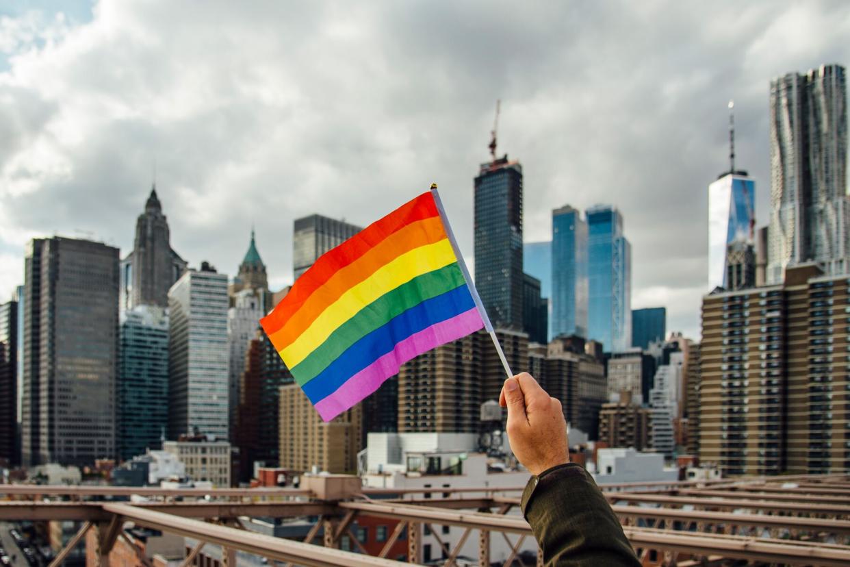 pride flag over new york city