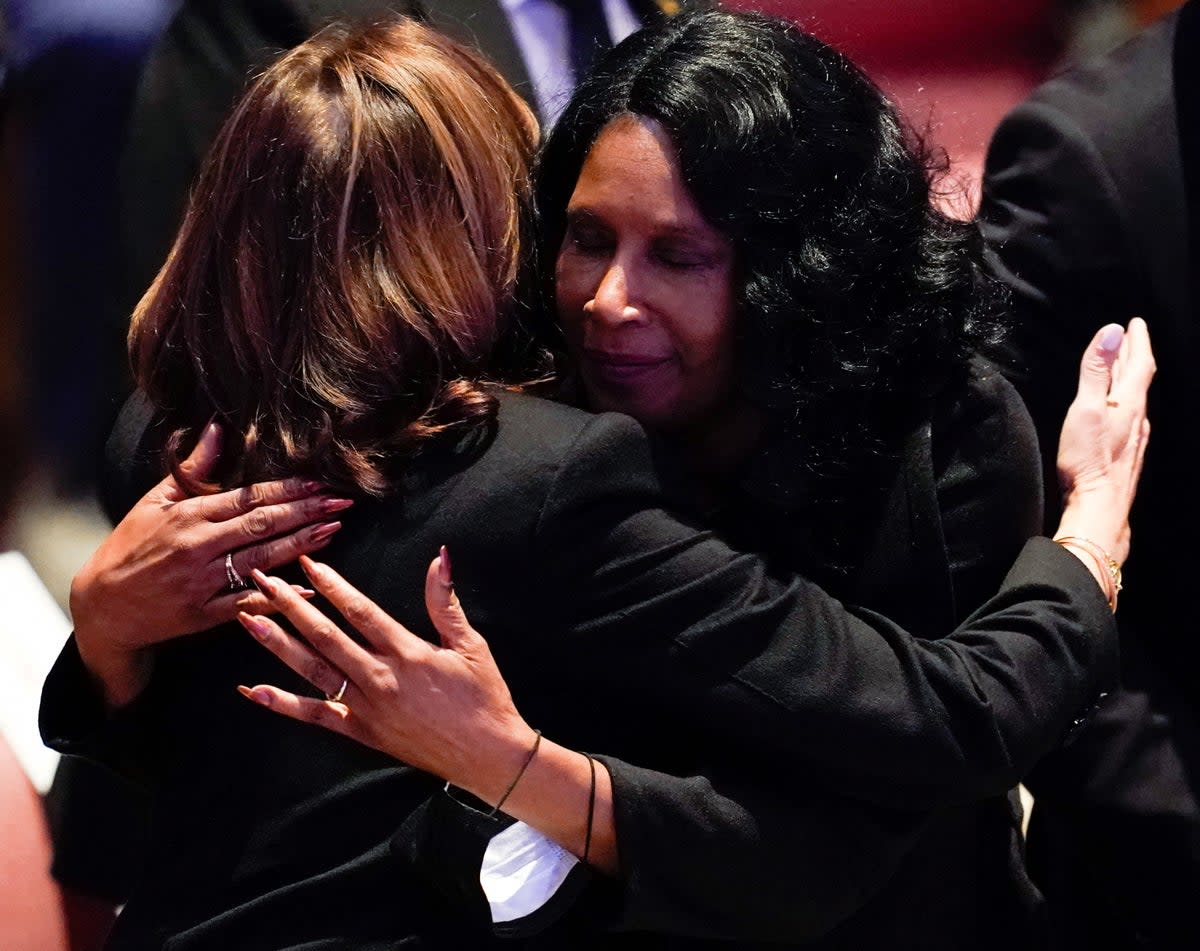 Kamala Harris, left, embraces RowVaughn Wells, the mother of Tyre Nichols, during a funeral for her son (Reuters)