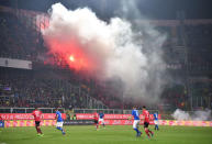 Football Soccer - Italy v Albania - World Cup 2018 Qualifiers - Group G - Renzo Barbera stadium, Palermo, Italy - 24/3/17. Albania's supporters light flares during the match. REUTERS/Alberto Lingria