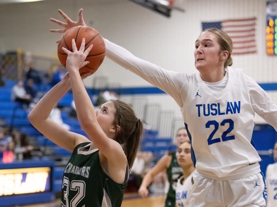 Tuslaw’s Destiny Dulkoski blocks the shot of Central Catholic’s Lily Belden on Wednesday, Jan. 24, 2024.