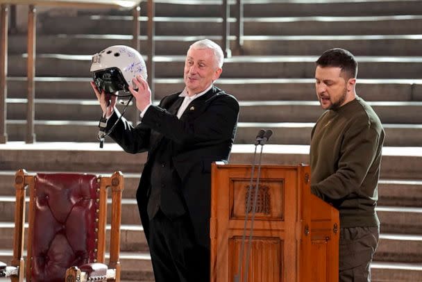 PHOTO: Speaker of the House of Commons, Sir Lindsay Hoyle, left, holds the helmet of one of the most successful Ukrainian pilots which was presented to him by Ukrainian President Volodymyr Zelenskyy on Feb. 8, 2023. (Stefan Rousseau/Pool via AP)