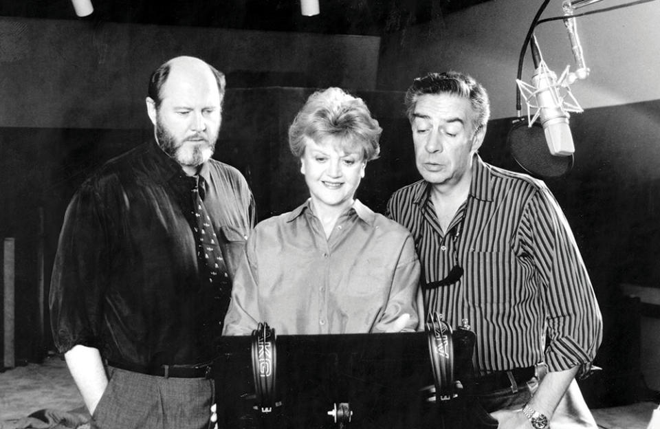 A recording session with the actors who voiced the characters — from left, David Ogden Stiers (Cogsworth); Angela Lansbury (Mrs. Potts) and Jerry Orbach (Lumiere). “We know how wonderful this movie is,” Lansbury said when other actors questioned the acting involved. - Credit: Buena Vista Pictures/Photofest.