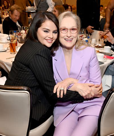 <p>Michael Kovac/Getty</p> (L-R) Selena Gomez and Meryl Streep attend the AFI Awards Luncheon on Jan. 12.