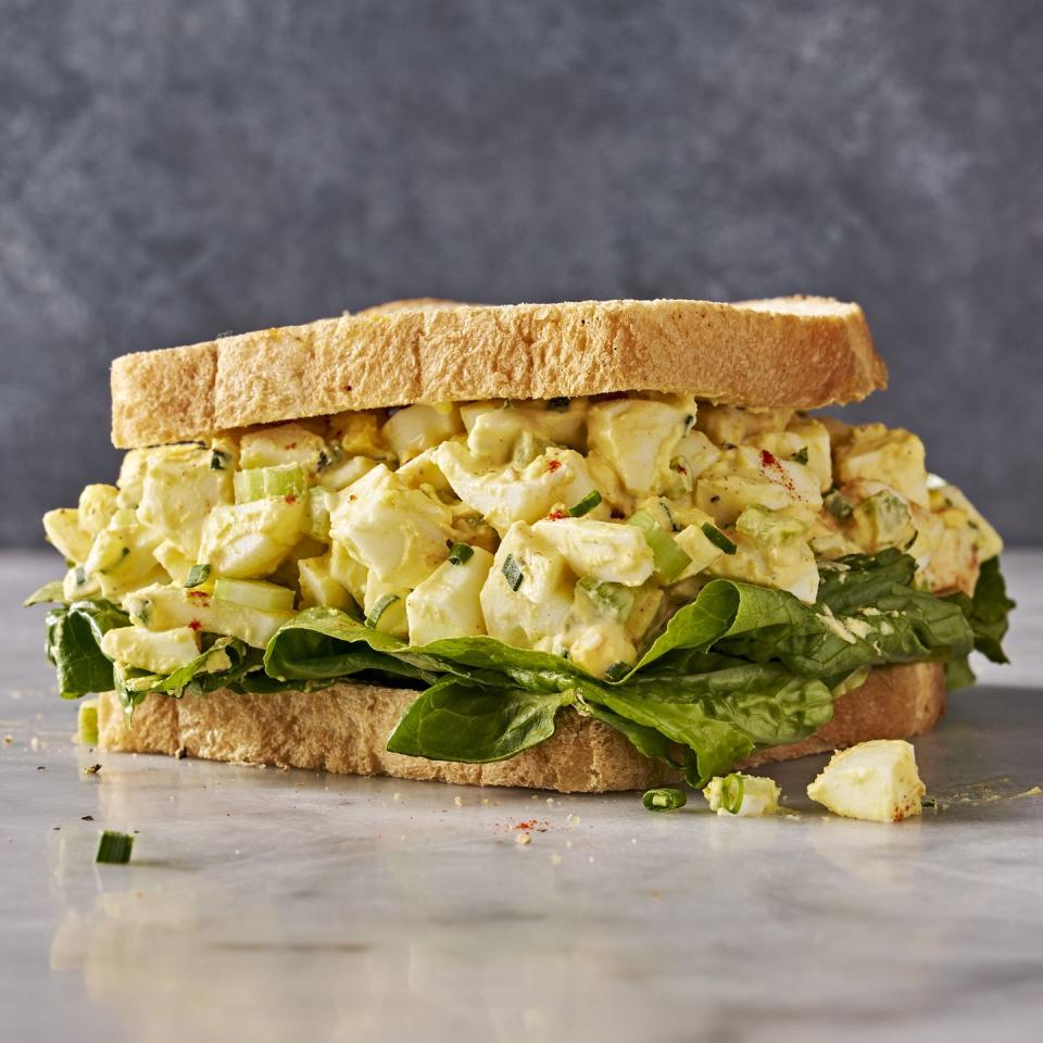 egg salad topped with chives and paprika