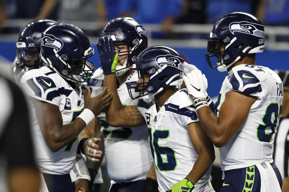 Geno Smith and Tyler Lockett had big fantasy days in an overtime win over the Lions. (AP Photo/Duane Burleson)