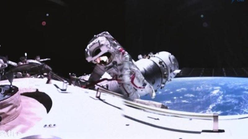 A Shenzhou 17 crew member repairing the solar panels during a recent spacewalk. - Image: China Manned Space