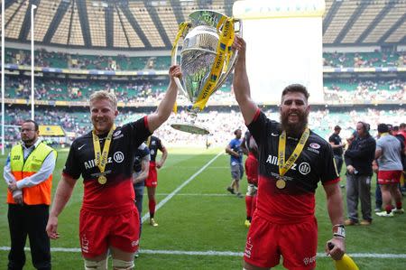 Britain Rugby Union - Saracens v Exeter Chiefs - Aviva Premiership Final - Twickenham Stadium - 28/5/16 Jackson Wray and Will Fraser of Saracens celebrate with the trophy after winning the Aviva Premiership Final Action Images via Reuters / Matthew Childs