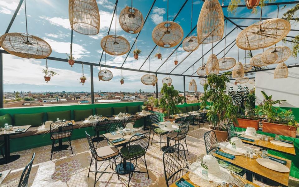 L'Mida is a groovy, emerald green rooftop restaurant that offers modern takes on Moroccan classics