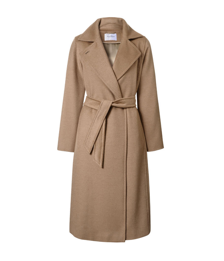 <p>Max Mara Manuela coat in camel, $2,850, <a rel="nofollow noopener" href="https://us.maxmara.com/p-1016147906001-manuela-camel" target="_blank" data-ylk="slk:maxmara.com;elm:context_link;itc:0;sec:content-canvas" class="link ">maxmara.com </a> </p>