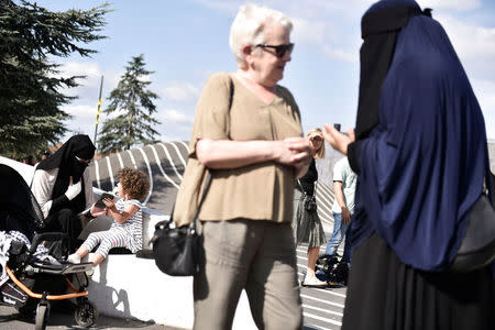 Demonstration on the first day of the implementation of the Danish face veil ban in Copenhagen, Denmark August 1, 2018. Mads Claus Rasmussen/Ritzau Scanpix/via REUTERS