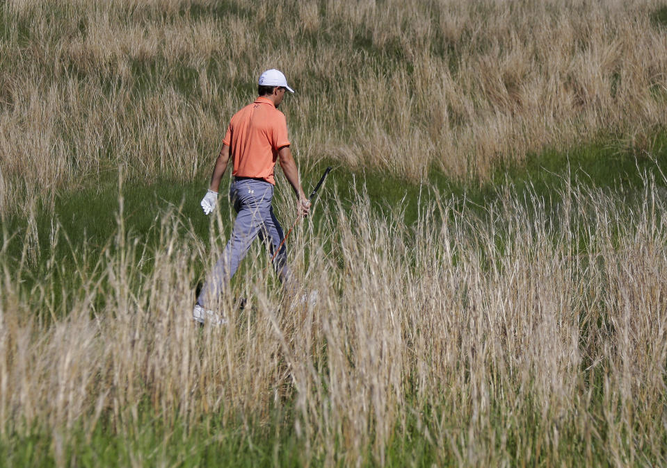 Jordan Spieth walks off the sixth tee during the third round of the PGA Championship golf tournament, Saturday, May 18, 2019, at Bethpage Black in Farmingdale, N.Y. (AP Photo/Seth Wenig)