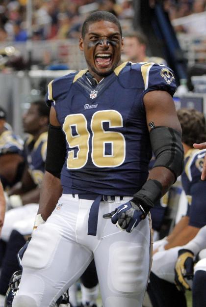 Michael Sam laughs on the sideline during the preseason game against the Packers. (AP)