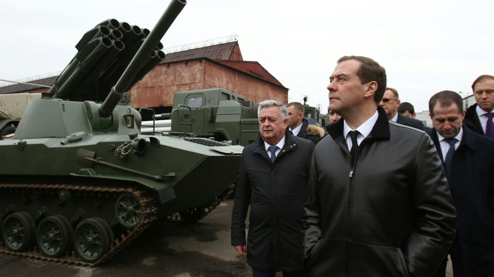 Then-Russian Prime Minister Dmitry Medvedev, front, visits the country's Motovilikha Plants manufacturer in 2016. Currently, the Remdiesel plant — Russia’s newest manufacturer of special, purpose-built equipment — is applying to purchase the Motovilikha Plants holding. (Yekaterina Shtukina/AFP via Getty Images)