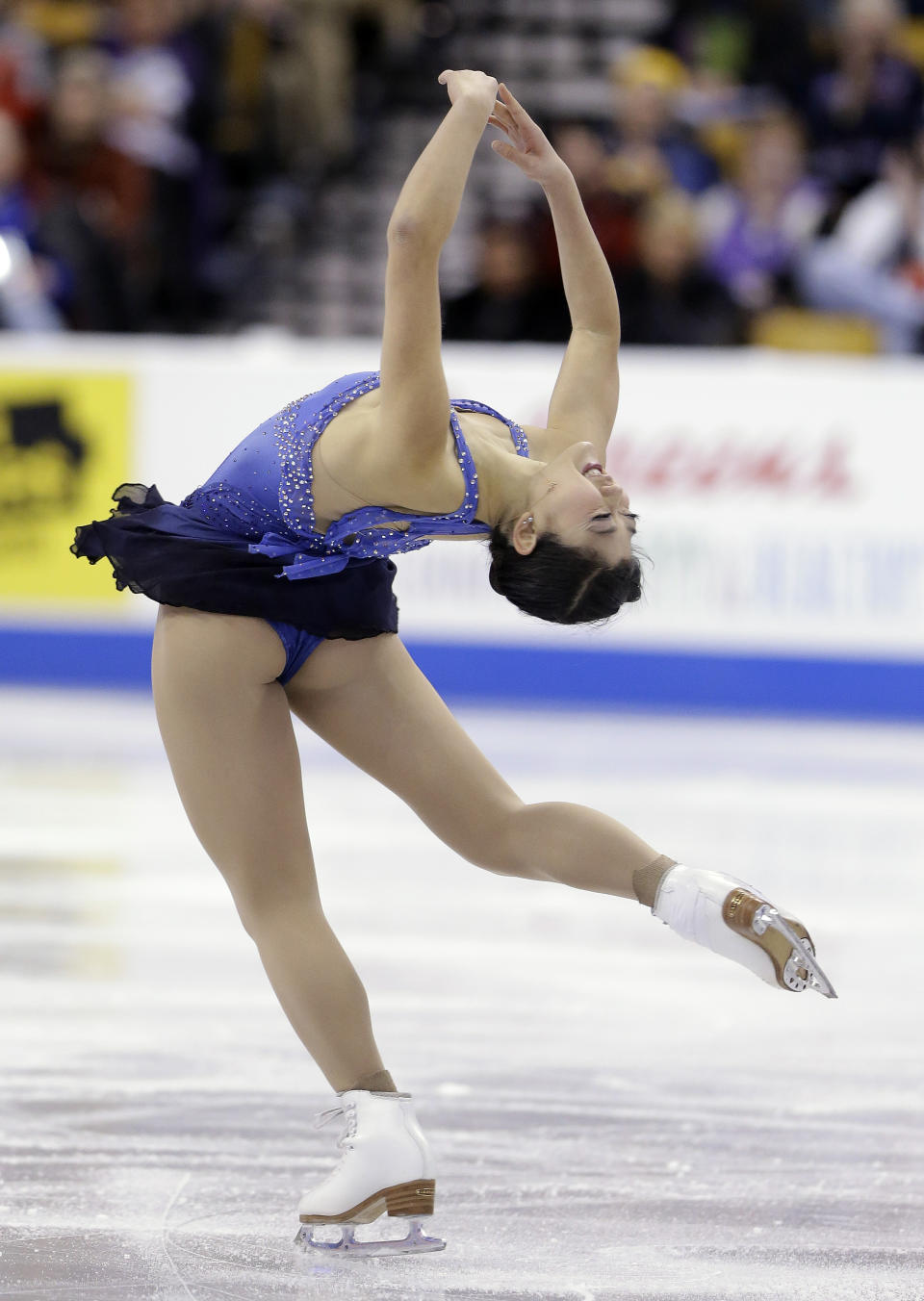 Mirai Nagasu skates during the women's short program at the U.S. Figure Skating Championships Thursday, 9, 2014 in Boston. (AP Photo/Steven Senne)