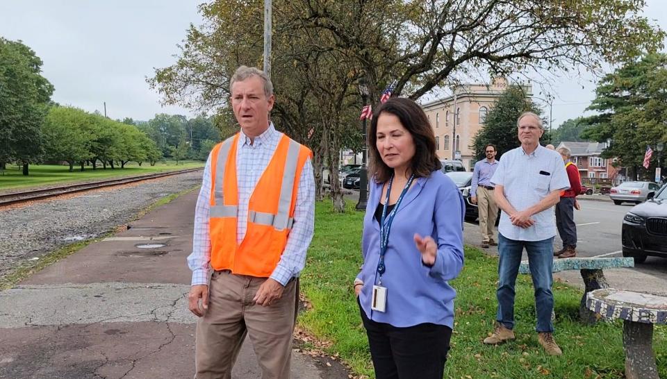 U.S. Rep. Matt Cartwright (D-Pa.) and Nicole Bucich, Amtrak vice president of network development, tour the proposed location for the East Stroudsburg train station, near the old Dansbury Depot, along the Lackawanna Extension route on Aug. 7, 2023.