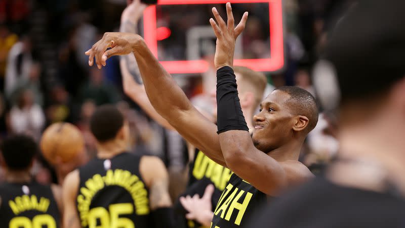 Utah Jazz guard Kris Dunn and his teammates throw T-shirts into the stands after the game as Utah defeated Denver at Vivint Arena in Salt Lake City on Saturday, April 8, 2023. 