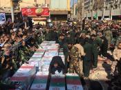 Caskets of those who died in a terror attack on a military parade in Iran are displayed in Ahvaz, Iran, Monday, Sept. 24, 2018. Iran on Monday held a mass funeral for those killed in the attack Saturday in the country's oil-rich southwest. (AP Photo/Ebrahim Noroozi)