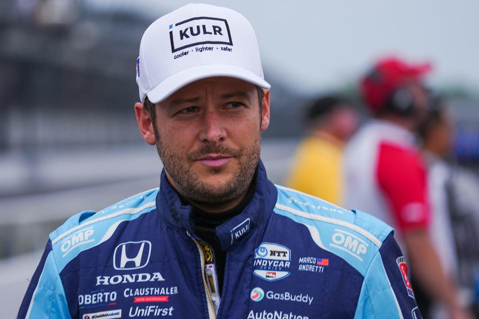 Andretti Herta Autosport with Marco Andretti and Curb-Agajanian driver Marco Andretti (98) makes his way to his car Saturday, May 21, 2022, during qualifying for the 106th running of the Indianapolis 500 at Indianapolis Motor Speedway.