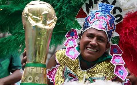 A Mexico fan enjoys the pre match atmosphere prior to the 2018 FIFA World Cup Russia group F match between Korea Republic and Mexico at Rostov Arena - Credit: Clive Mason/Getty Images