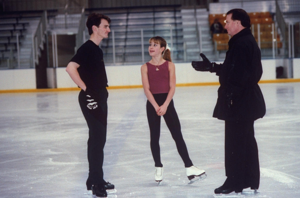 Figure skating champion Todd Edlredge (L) chatting w. pal, figure skating champion Tara Lipinsky & his coach Richard Callaghan, during break in practice session at the Dettroit Skating Club.  (Photo by Taro Yamasaki/The LIFE Images Collection via Getty Images/Getty Images)