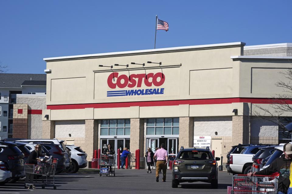 FILE - People enter Costco Warehouse in Cranberry Township, Pa., Friday, March 29, 2024. Costco bargain hunters are going to have to pay an additional $5 to $10 annually as the popular warehouse chain prepares to raise its membership fees for the first time in seven years. (AP Photo/Gene J. Puskar, File)