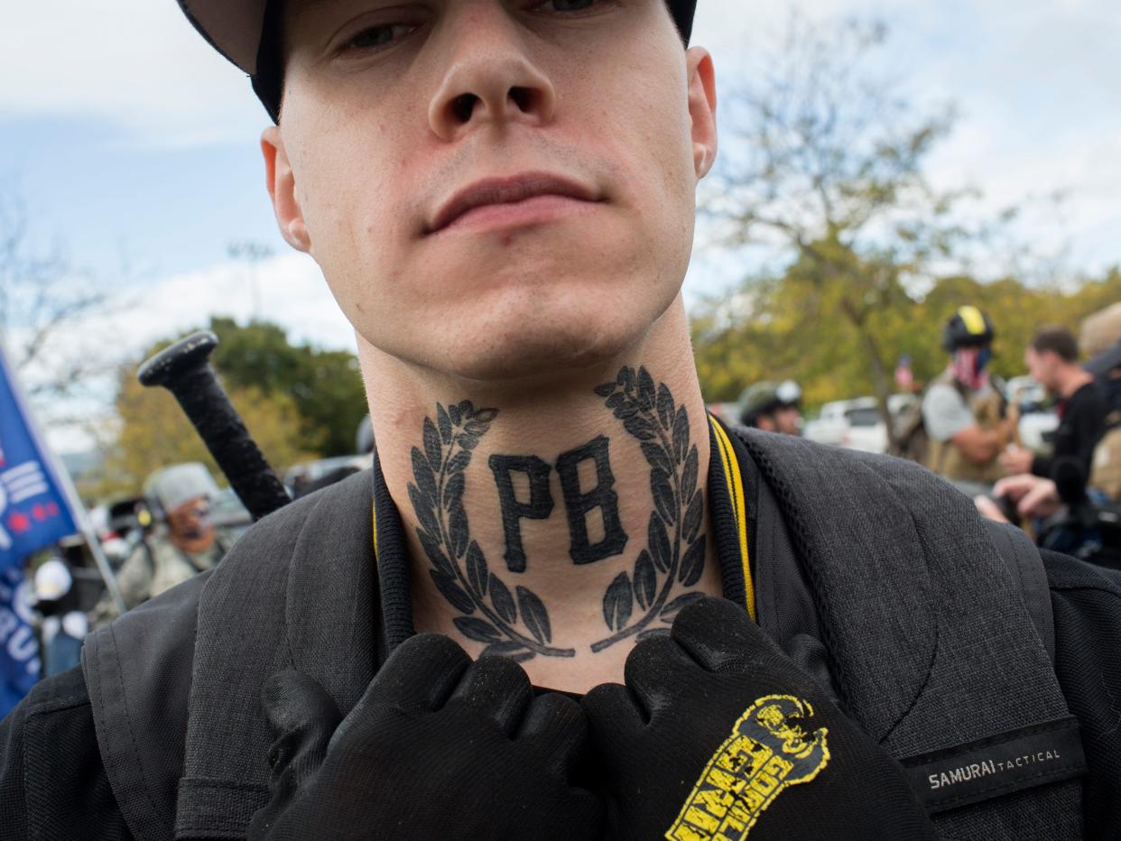 Proud Boys symbol tattoo