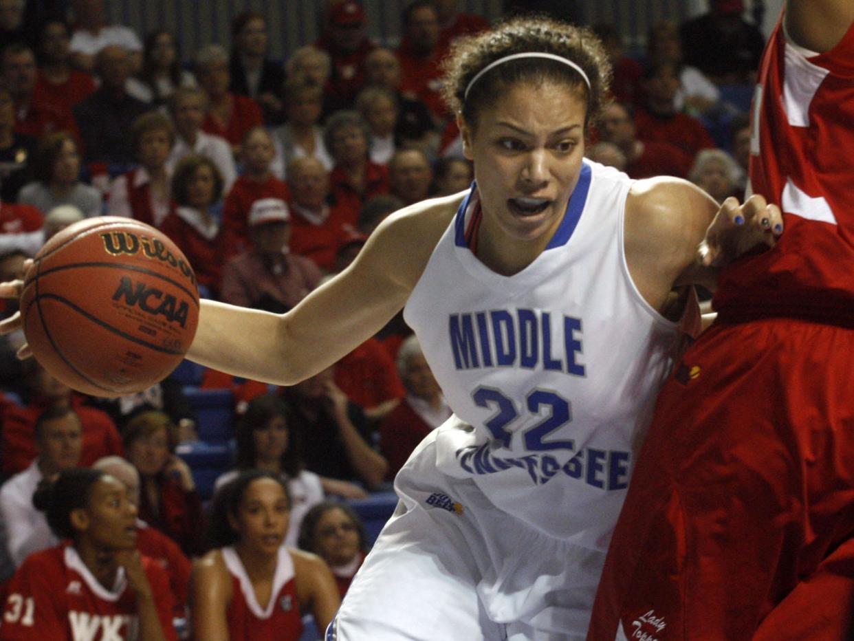 MTSU's Alysha Clark fights her way to the net in the first half against Western Kentucky during Sun Belt semifinals Monday, March 8, 2010 in Hot Springs, Ark.