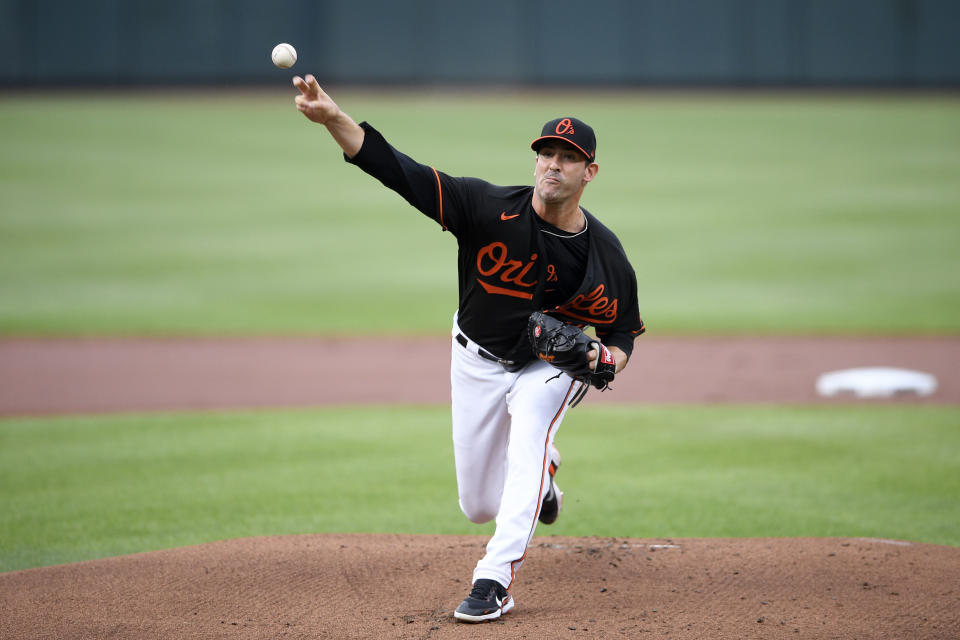 Baltimore Orioles starting pitcher Matt Harvey delivers during the first inning of a baseball game against the Washington Nationals, Saturday, July 24, 2021, in Baltimore. (AP Photo/Nick Wass)