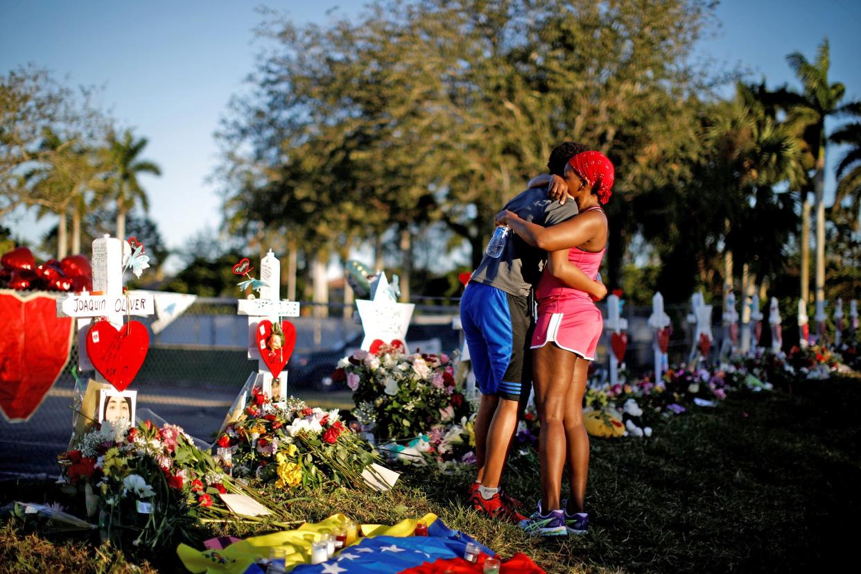 Mourners at a vigil in Parkland, Florida following the February shooting: Reuters